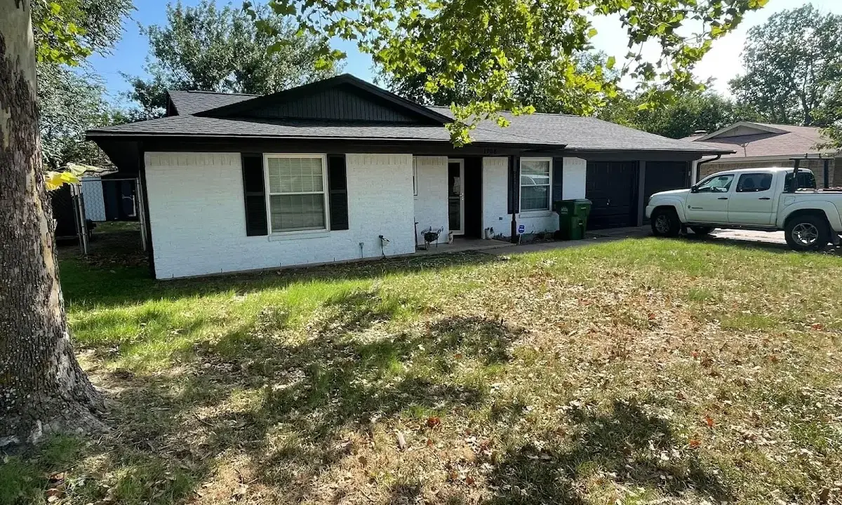 Professional roofing crew working on a residential roof in Chesapeake Beach